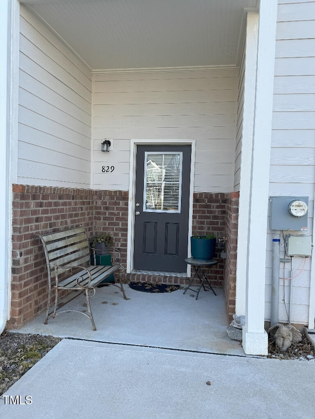 829 S Franklin St, Wake Forest, NC 27587 - property entrance with brick siding