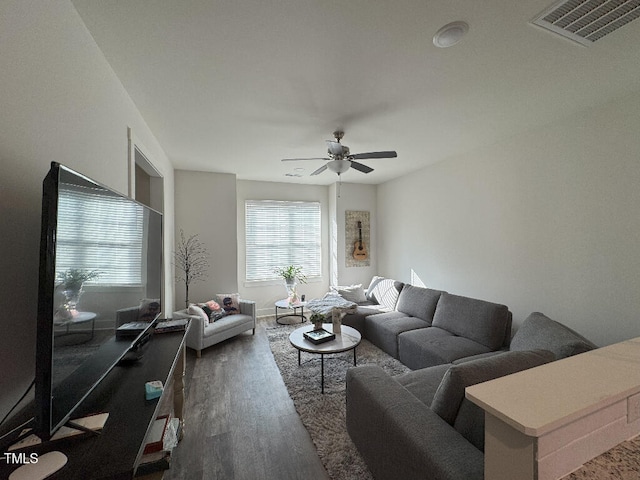 829 S Franklin St, Wake Forest, NC 27587 - living area with visible vents, wood finished floors, and a ceiling fan