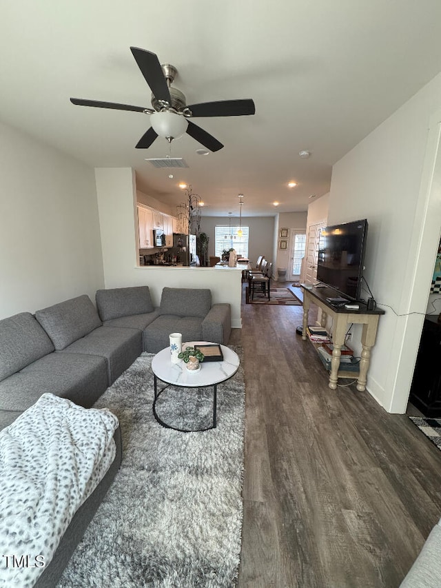 829 S Franklin St, Wake Forest, NC 27587 - living room with visible vents, a ceiling fan, recessed lighting, and dark wood-style flooring