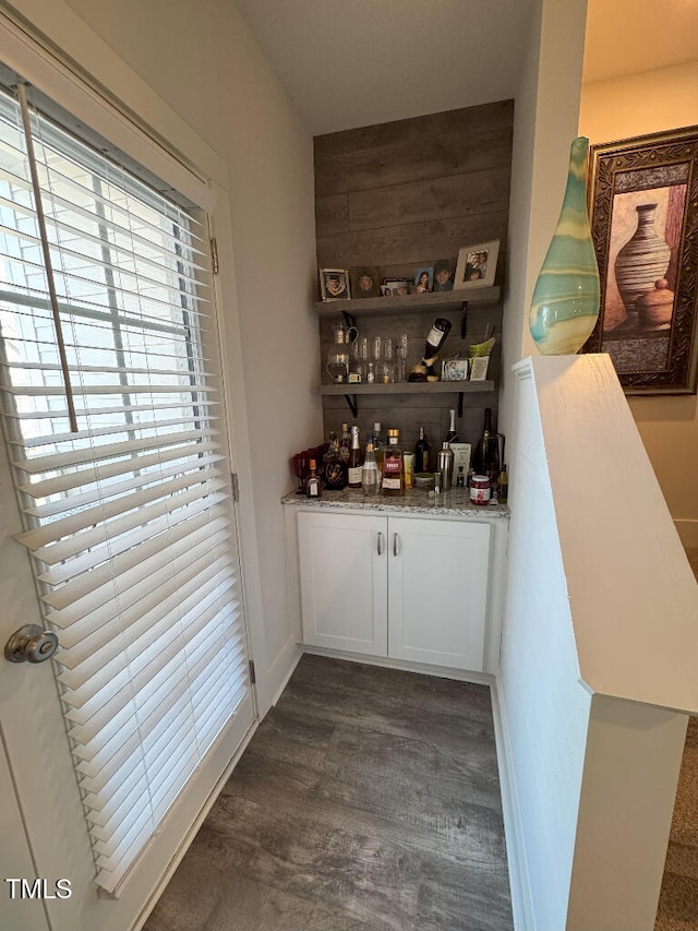 829 S Franklin St, Wake Forest, NC 27587 - bar with dark wood-style floors, wooden walls, and a dry bar