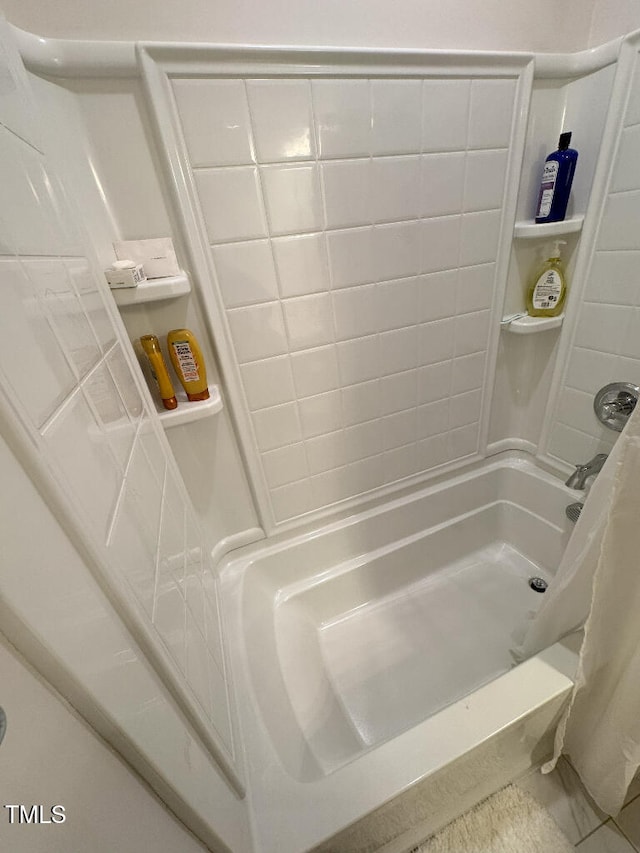 829 S Franklin St, Wake Forest, NC 27587 - bathroom featuring a shower with shower curtain