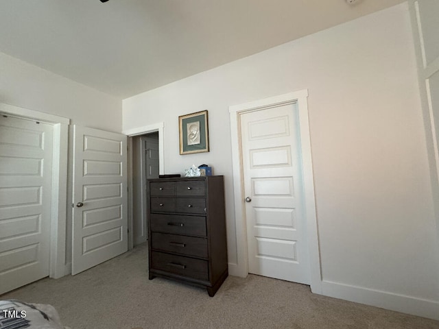 829 S Franklin St, Wake Forest, NC 27587 - bedroom featuring baseboards and light colored carpet
