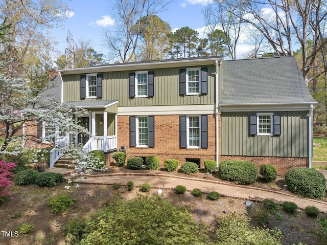 1302 Hermitage Rd, Sanford, NC 27330 - view of front of home with brick siding and board and batten siding
