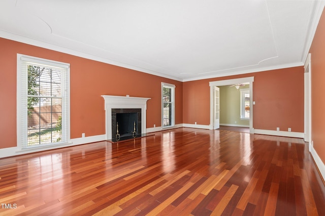 1302 Hermitage Rd, Sanford, NC 27330 - unfurnished living room with a healthy amount of sunlight, ceiling fan, crown molding, and wood finished floors