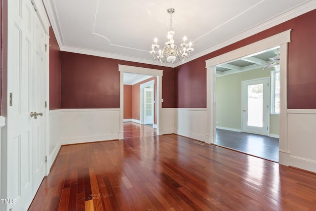 1302 Hermitage Rd, Sanford, NC 27330 - interior space featuring wood-type flooring, an inviting chandelier, ornamental molding, and wainscoting