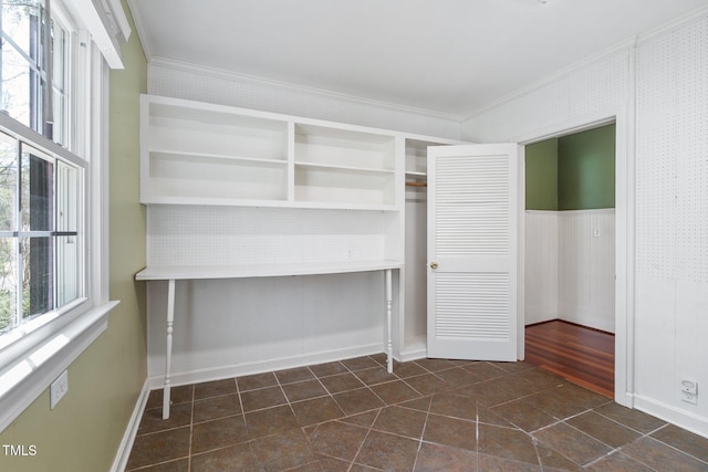 1302 Hermitage Rd, Sanford, NC 27330 - interior space with dark tile patterned floors, a closet, baseboards, and ornamental molding