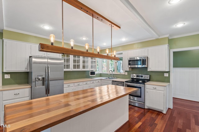 1302 Hermitage Rd, Sanford, NC 27330 - kitchen featuring stainless steel appliances, a sink, wooden counters, and white cabinetry