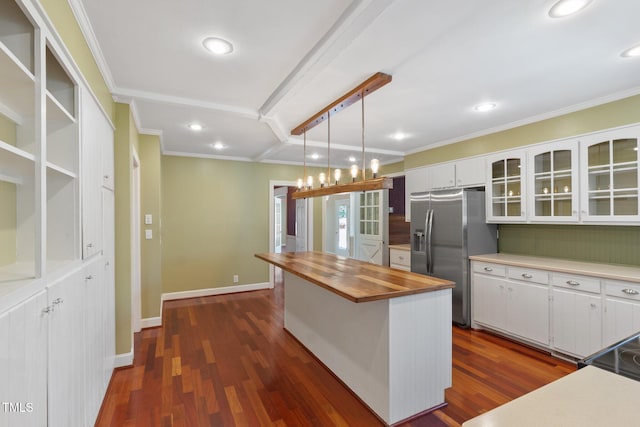 1302 Hermitage Rd, Sanford, NC 27330 - kitchen featuring white cabinets, stainless steel refrigerator with ice dispenser, ornamental molding, wood counters, and a kitchen island