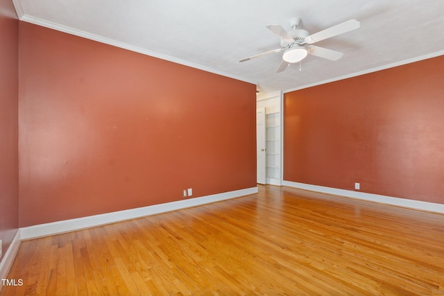 1302 Hermitage Rd, Sanford, NC 27330 - spare room featuring light wood-style flooring, crown molding, ceiling fan, and baseboards