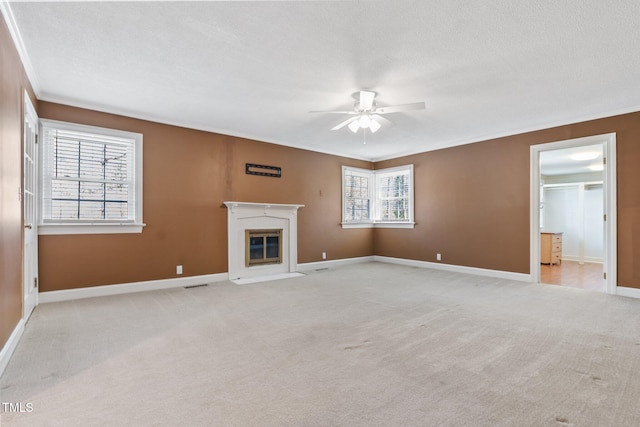 1302 Hermitage Rd, Sanford, NC 27330 - unfurnished living room featuring light carpet, baseboards, and ceiling fan