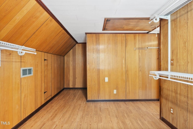 1302 Hermitage Rd, Sanford, NC 27330 - bonus room with wooden walls, visible vents, and light wood-style floors