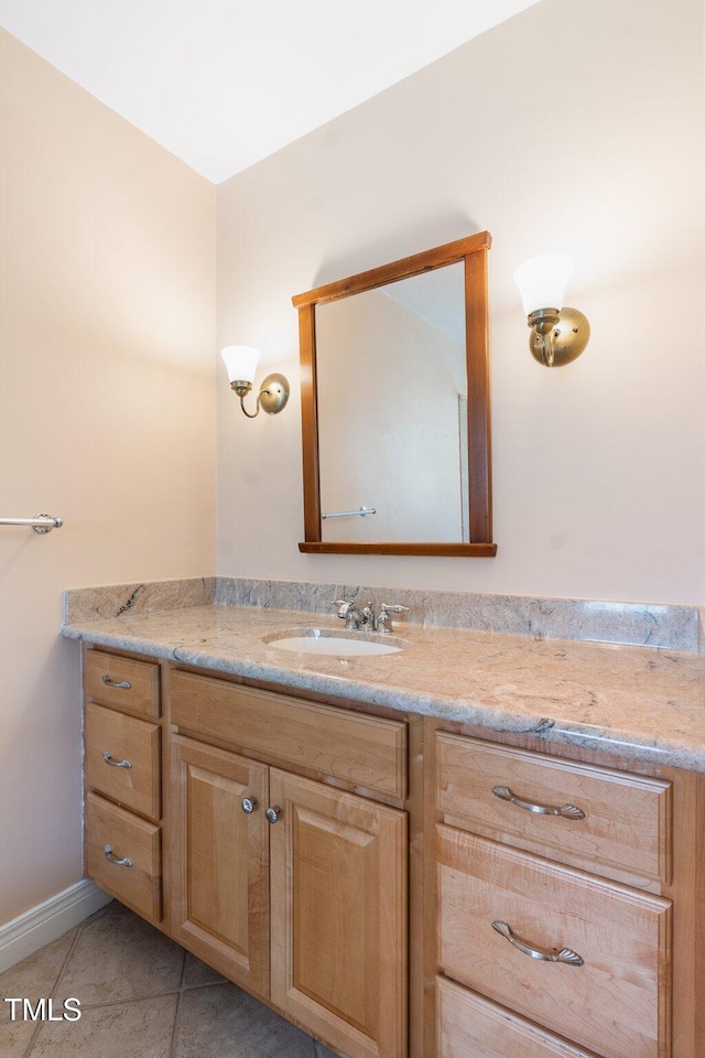 1302 Hermitage Rd, Sanford, NC 27330 - bathroom with tile patterned floors, vanity, and baseboards