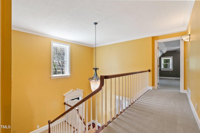 1302 Hermitage Rd, Sanford, NC 27330 - hallway with visible vents, an upstairs landing, carpet floors, crown molding, and baseboards