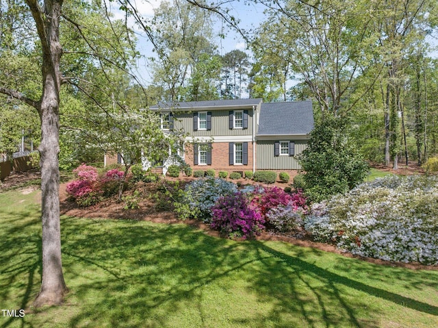 1302 Hermitage Rd, Sanford, NC 27330 - view of front of home featuring a front lawn and brick siding