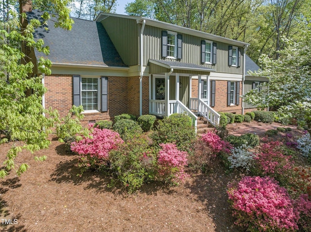 1302 Hermitage Rd, Sanford, NC 27330 - traditional-style home with brick siding and board and batten siding