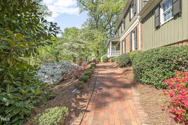 1302 Hermitage Rd, Sanford, NC 27330 - view of side of home featuring board and batten siding
