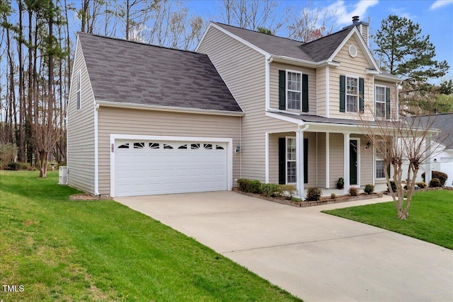 traditional-style home featuring driveway, an attached garage, a porch, and a front yard
