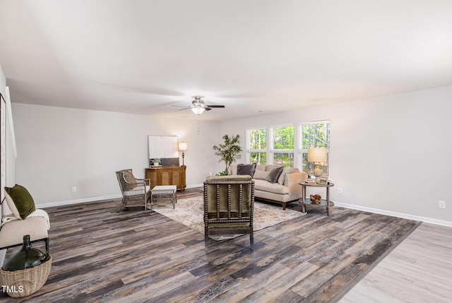 709 Conifer Ct, Creedmoor, NC 27522 - living area with wood finished floors, baseboards, and a ceiling fan