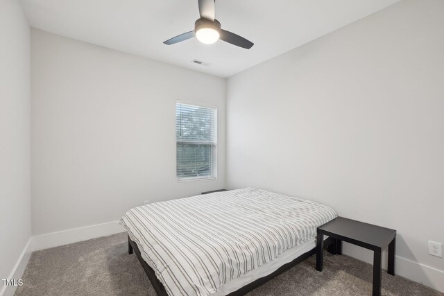 5616 Horsewalk Cir, Raleigh, NC 27606 - carpeted bedroom with visible vents, baseboards, and a ceiling fan