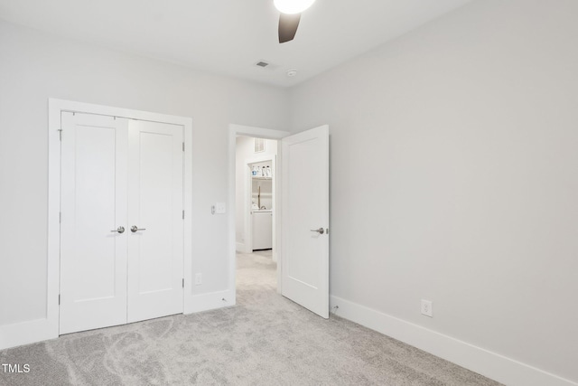 5616 Horsewalk Cir, Raleigh, NC 27606 - unfurnished bedroom featuring light carpet, visible vents, baseboards, and a closet