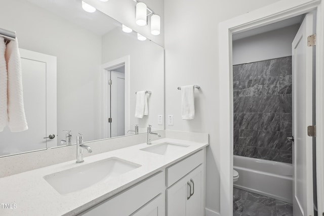5616 Horsewalk Cir, Raleigh, NC 27606 - bathroom with a sink, toilet, double vanity, and marble finish floor