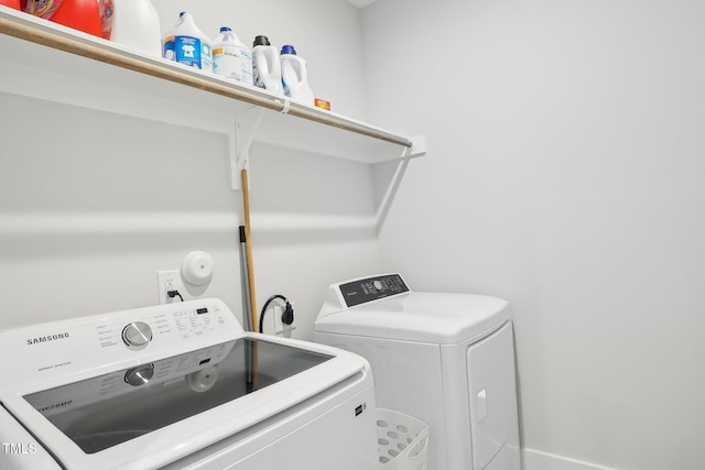 5616 Horsewalk Cir, Raleigh, NC 27606 - washroom featuring washing machine and dryer and laundry area
