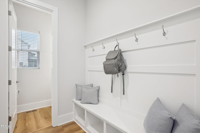 5616 Horsewalk Cir, Raleigh, NC 27606 - mudroom featuring light wood-type flooring, baseboards, and visible vents