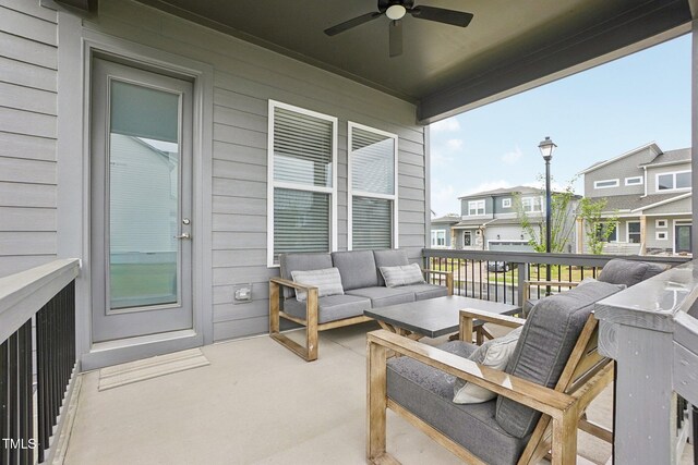 5616 Horsewalk Cir, Raleigh, NC 27606 - balcony with an outdoor living space, ceiling fan, and a residential view