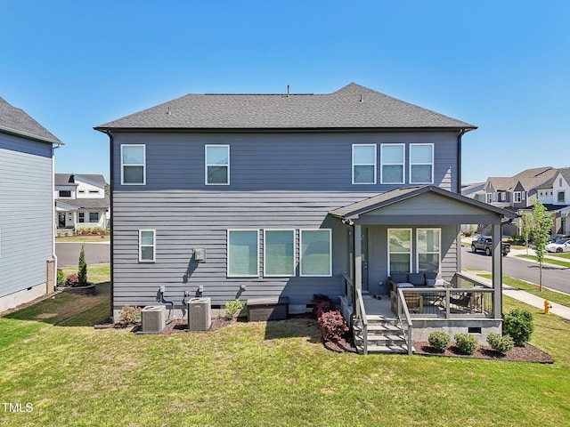 5616 Horsewalk Cir, Raleigh, NC 27606 - rear view of house with central air condition unit, crawl space, a yard, covered porch, and a shingled roof