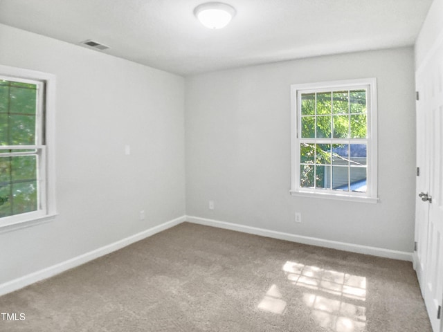 4601 Pemberton Dr, Raleigh, NC 27609 - spare room featuring carpet floors and baseboards