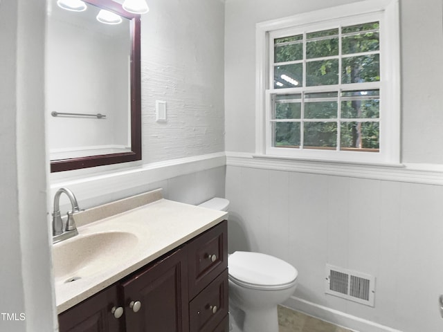 4601 Pemberton Dr, Raleigh, NC 27609 - half bath with vanity and wainscoting