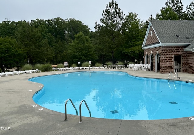 228 Dove Cottage Ln, Cary, NC 27519 - community pool featuring a patio area and fence