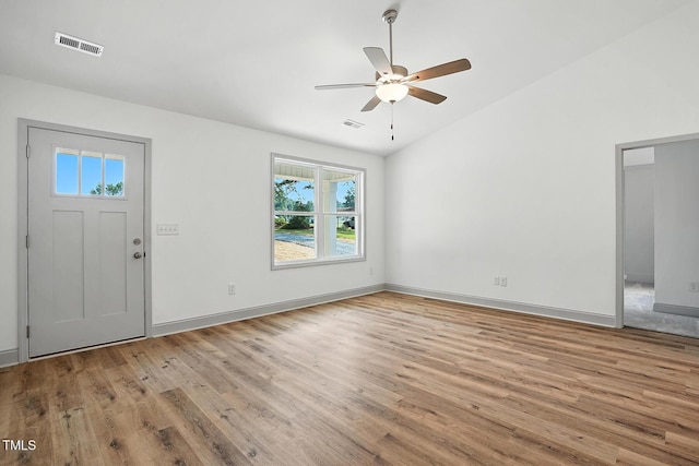 5500 Lake Wendell Rd, Zebulon, NC 27597 - entryway featuring wood finished floors, vaulted ceiling, and a ceiling fan