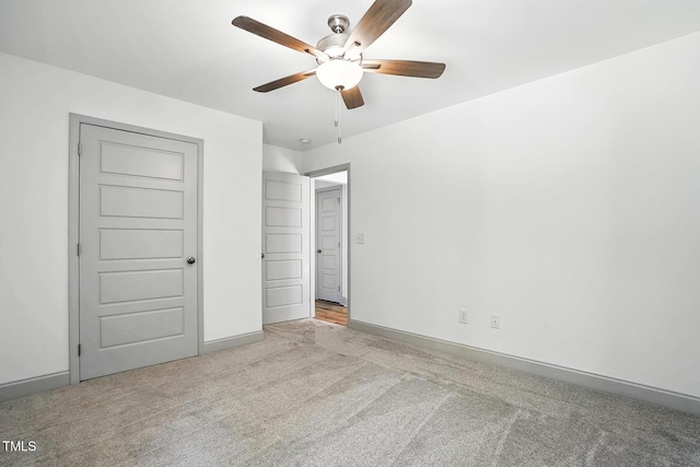 5500 Lake Wendell Rd, Zebulon, NC 27597 - unfurnished bedroom with carpet flooring and ceiling fan