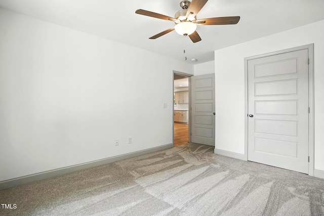 5500 Lake Wendell Rd, Zebulon, NC 27597 - unfurnished bedroom featuring carpet floors and ceiling fan