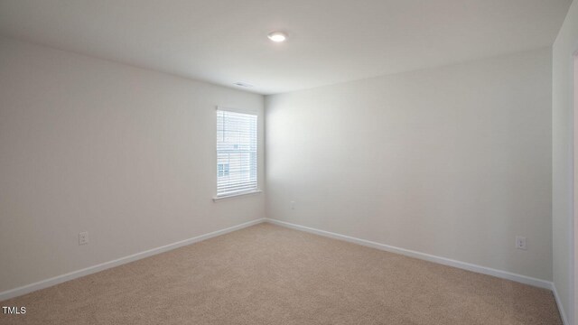 291 Hanging Elm Ln, Fuquay Varina, NC 27526 - unfurnished room featuring light carpet and baseboards
