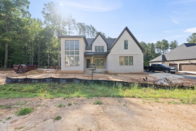 2957 Wexford Pond Way, Wake Forest, NC 27587 - view of front of property with board and batten siding