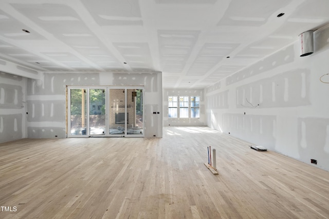2957 Wexford Pond Way, Wake Forest, NC 27587 - unfurnished living room with wood finished floors