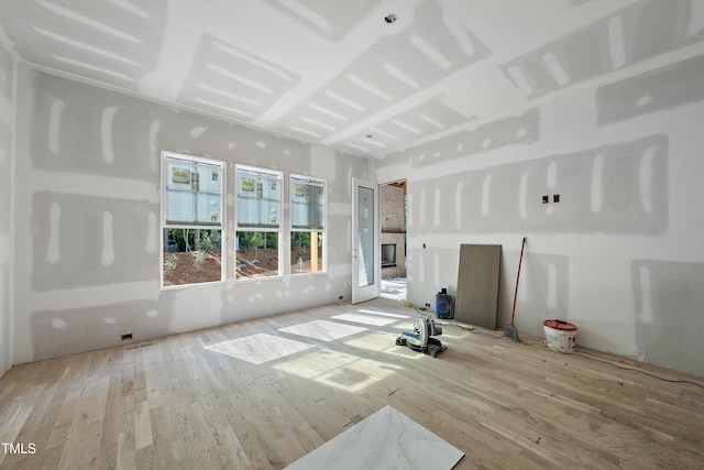 2957 Wexford Pond Way, Wake Forest, NC 27587 - unfurnished living room with wood finished floors
