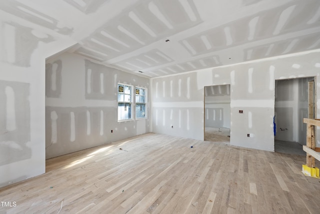 2957 Wexford Pond Way, Wake Forest, NC 27587 - unfurnished living room featuring wood finished floors