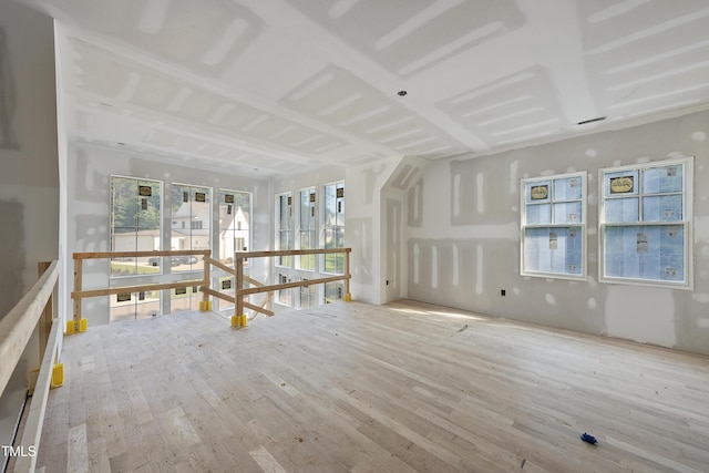 2957 Wexford Pond Way, Wake Forest, NC 27587 - unfurnished living room with wood finished floors