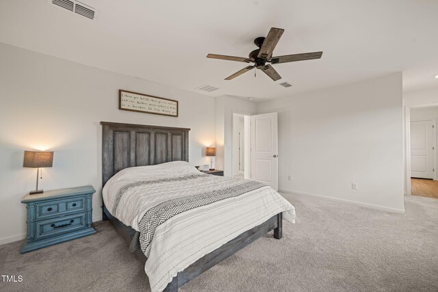 1417 Underbrush Dr, Durham, NC 27703 - carpeted bedroom featuring baseboards, visible vents, and ceiling fan
