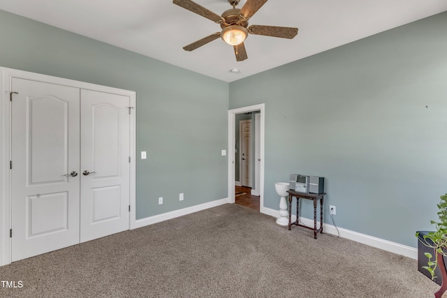 5595 Godwin Lake Rd, Benson, NC 27504 - unfurnished bedroom featuring carpet floors, a ceiling fan, baseboards, and a closet
