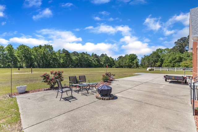 5595 Godwin Lake Rd, Benson, NC 27504 - view of patio / terrace featuring fence and a fire pit