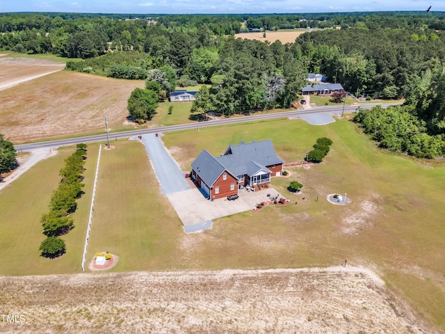 5595 Godwin Lake Rd, Benson, NC 27504 - drone / aerial view featuring a wooded view