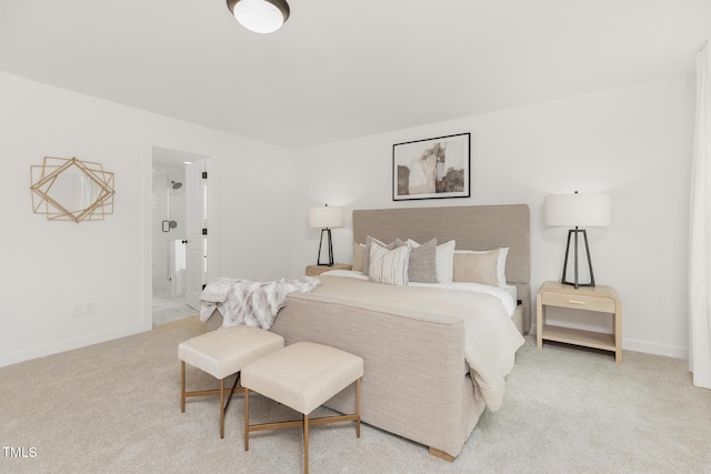 111 Silver Moon Ln Unit 121, Clayton, NC 27527 - bedroom with ensuite bathroom, carpet, and baseboards