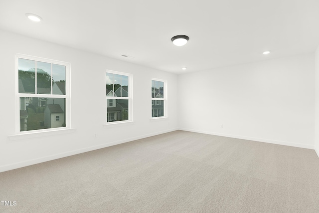 111 Silver Moon Ln Unit 121, Clayton, NC 27527 - spare room featuring carpet, recessed lighting, and baseboards