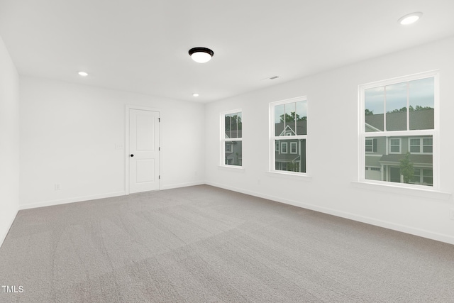 111 Silver Moon Ln Unit 121, Clayton, NC 27527 - carpeted spare room with baseboards and recessed lighting