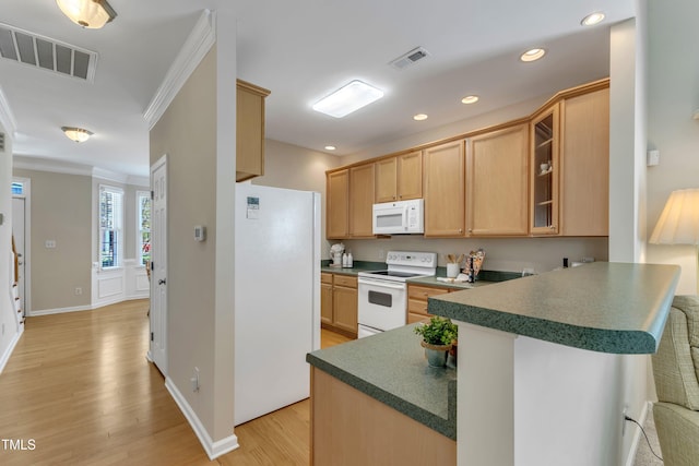 9005 River Estates Dr, Knightdale, NC 27545 - kitchen featuring visible vents, ornamental molding, white appliances, and light wood-type flooring