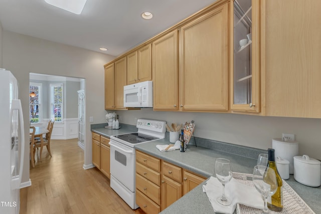 9005 River Estates Dr, Knightdale, NC 27545 - kitchen featuring light wood finished floors, light brown cabinets, white appliances, recessed lighting, and glass insert cabinets